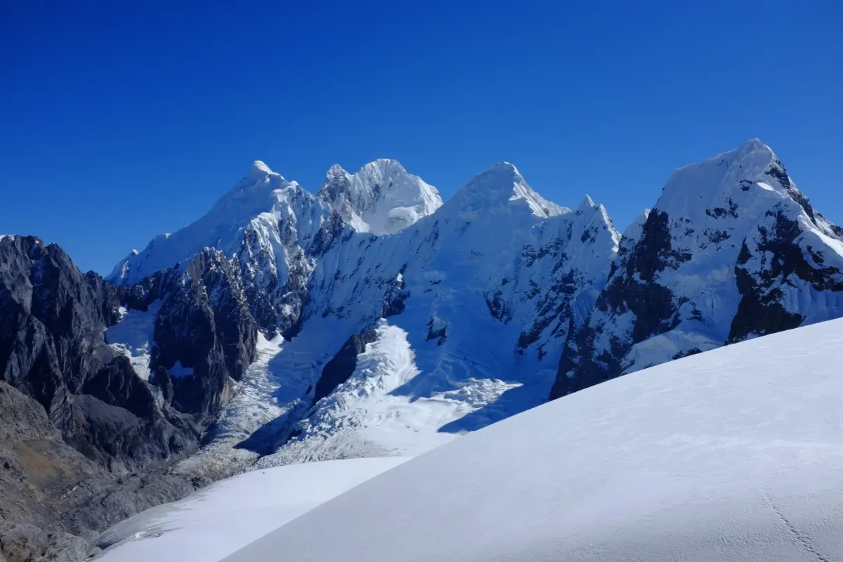 Glaciated peaks under a deep-blue Andean sky
