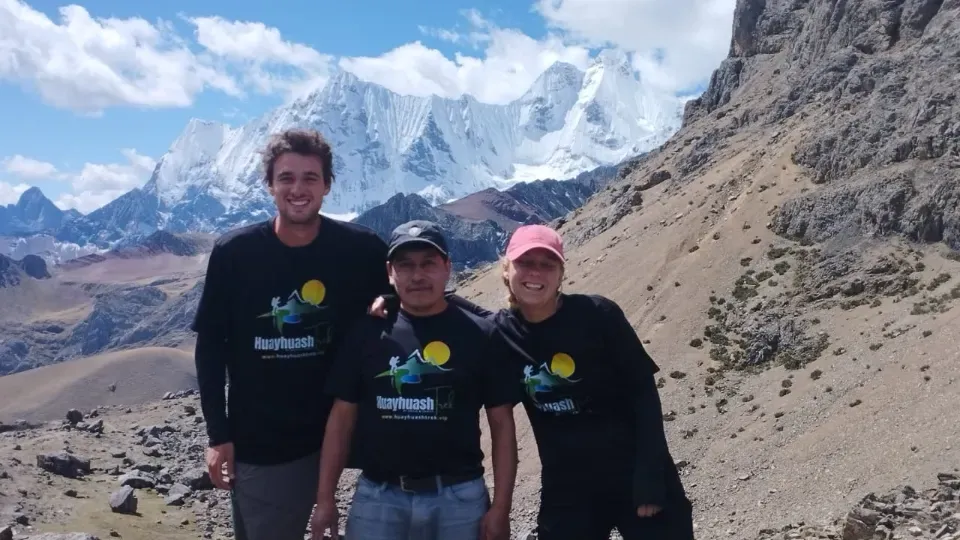 Trekkers in Huayhuash Trek shirts on a mountain trail